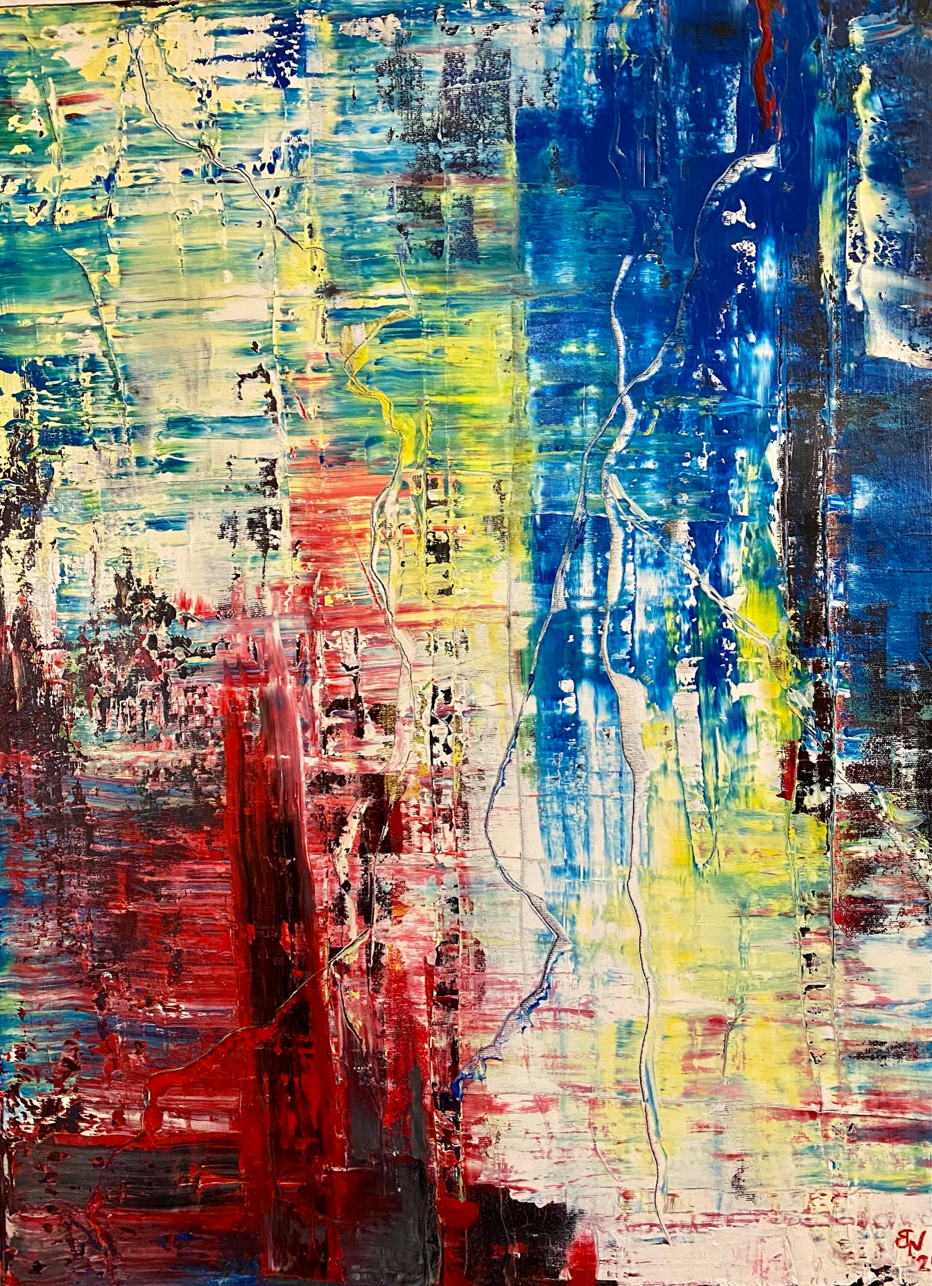 Eine abstrakte Malerei mit lebendigen Farben wie Blau, Gelb, Rot und Weiß. Die Farben sind in unregelmäßigen Mustern und Texturen angeordnet.